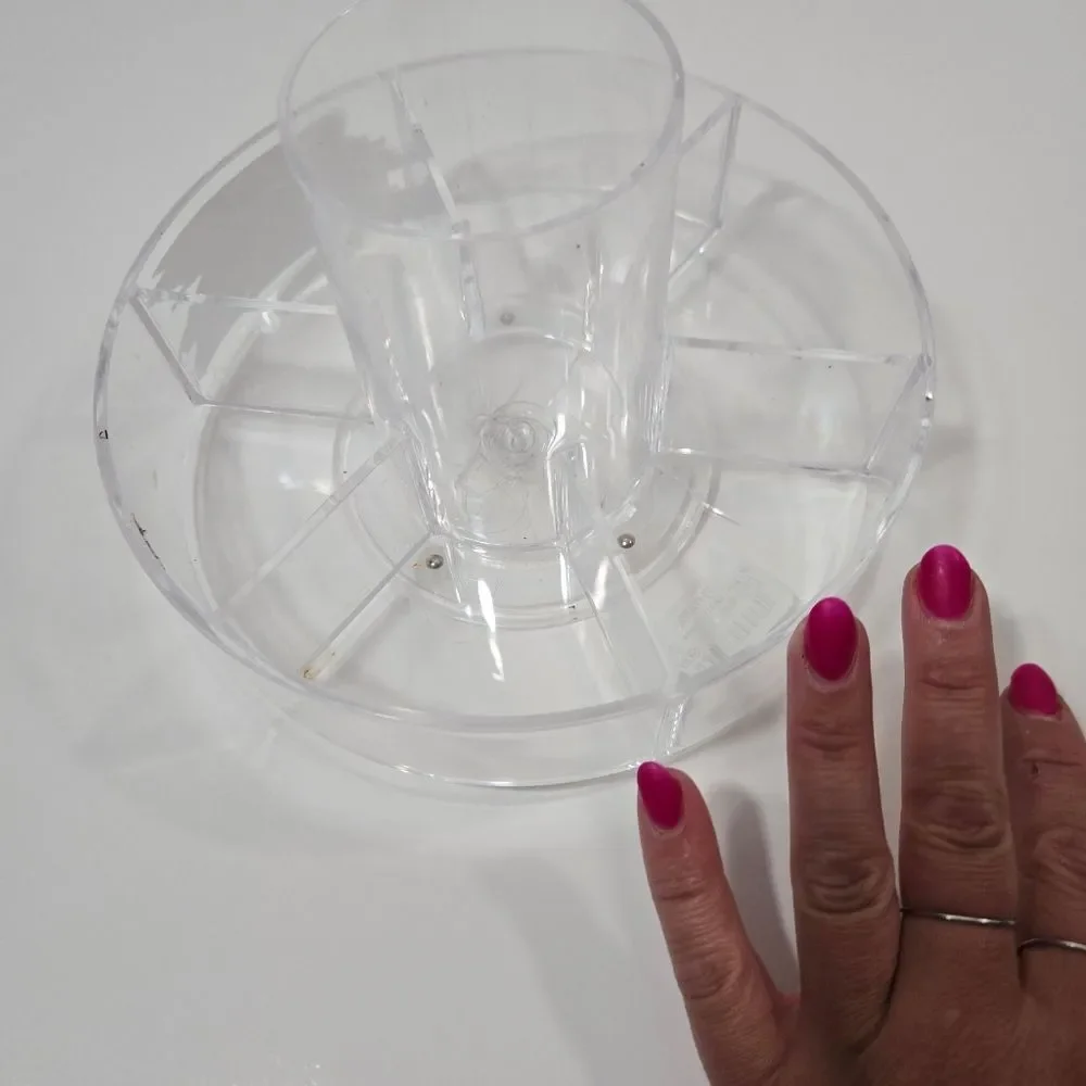 Circle, moveable makeup holder